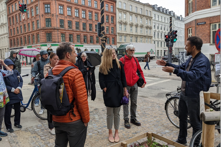 Councilmember Marcus Vesterager walks the group through Copenhagen’s neighborhoods.