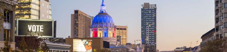 San Francisco City Hall lit up red, white and blue during election season